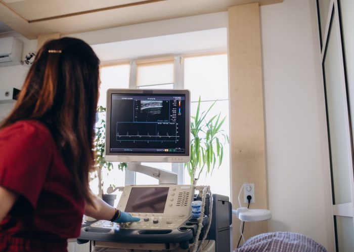 doctor makes ultrasound of pregnancy to patient g 2025 03 15 23 03 06 utc scaled