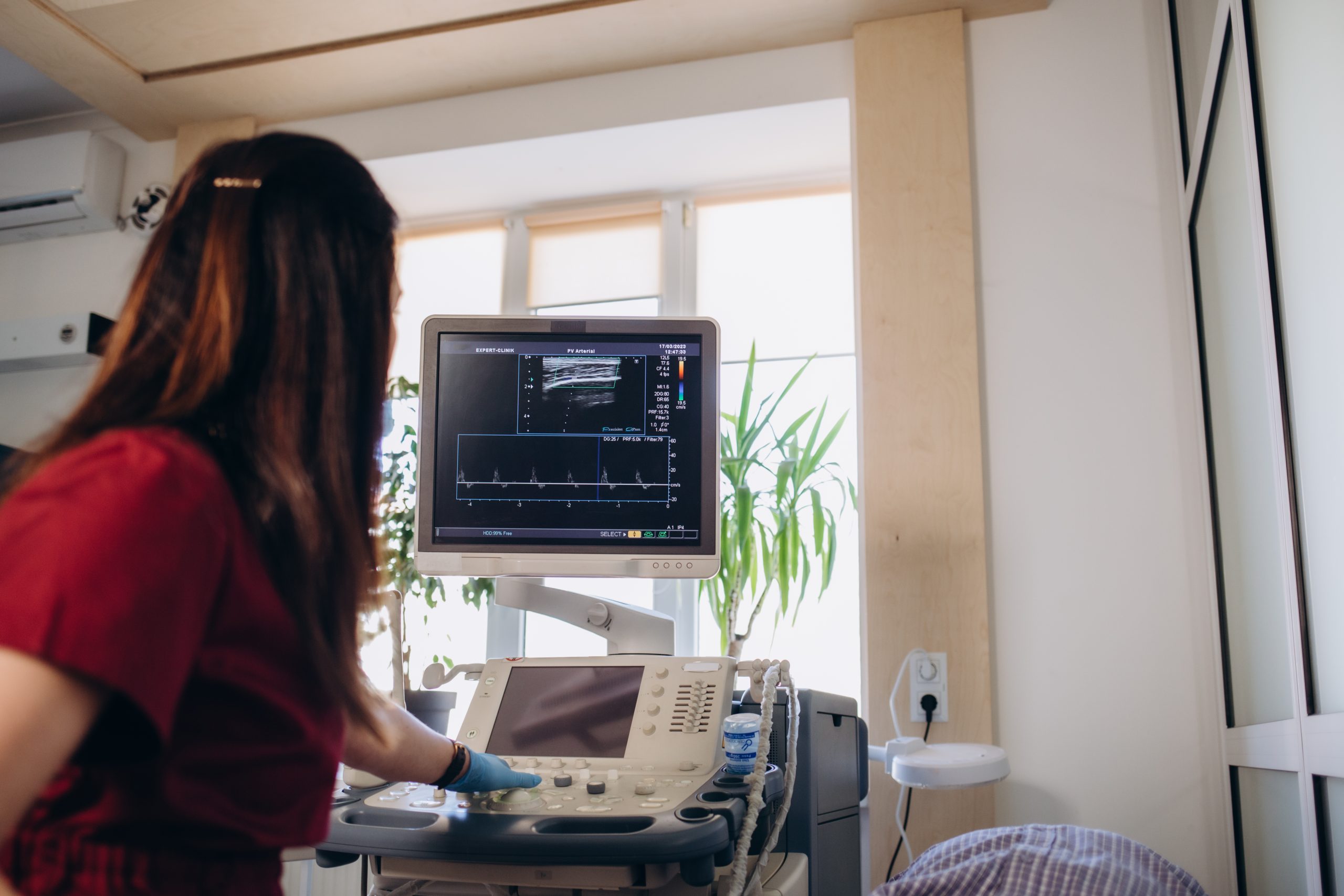 doctor makes ultrasound of pregnancy to patient g 2025 03 15 23 03 06 utc scaled