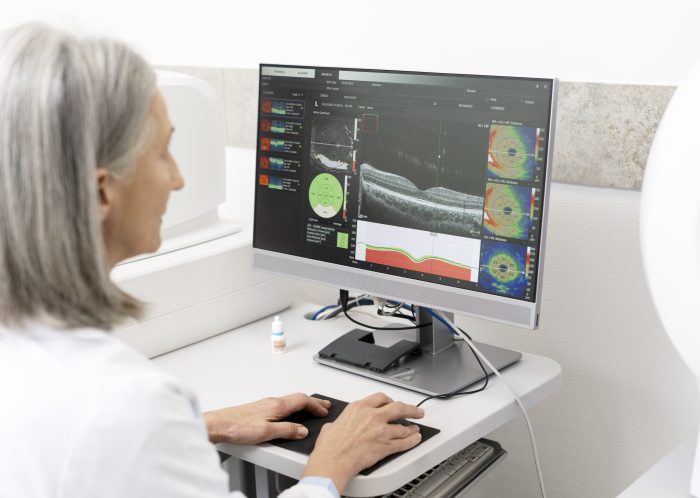 senior doctor analyzing optical coherence tomograp 2025 02 20 11 03 51 utc scaled