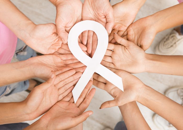 women hands circle holding breast cancer white rib 2025 03 18 16 57 48 utc scaled